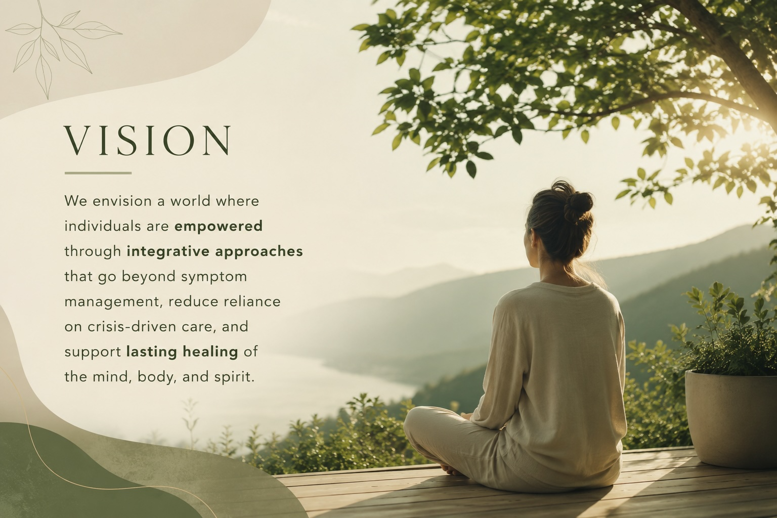 Woman seated in meditation on a deck overlooking a misty mountain valley